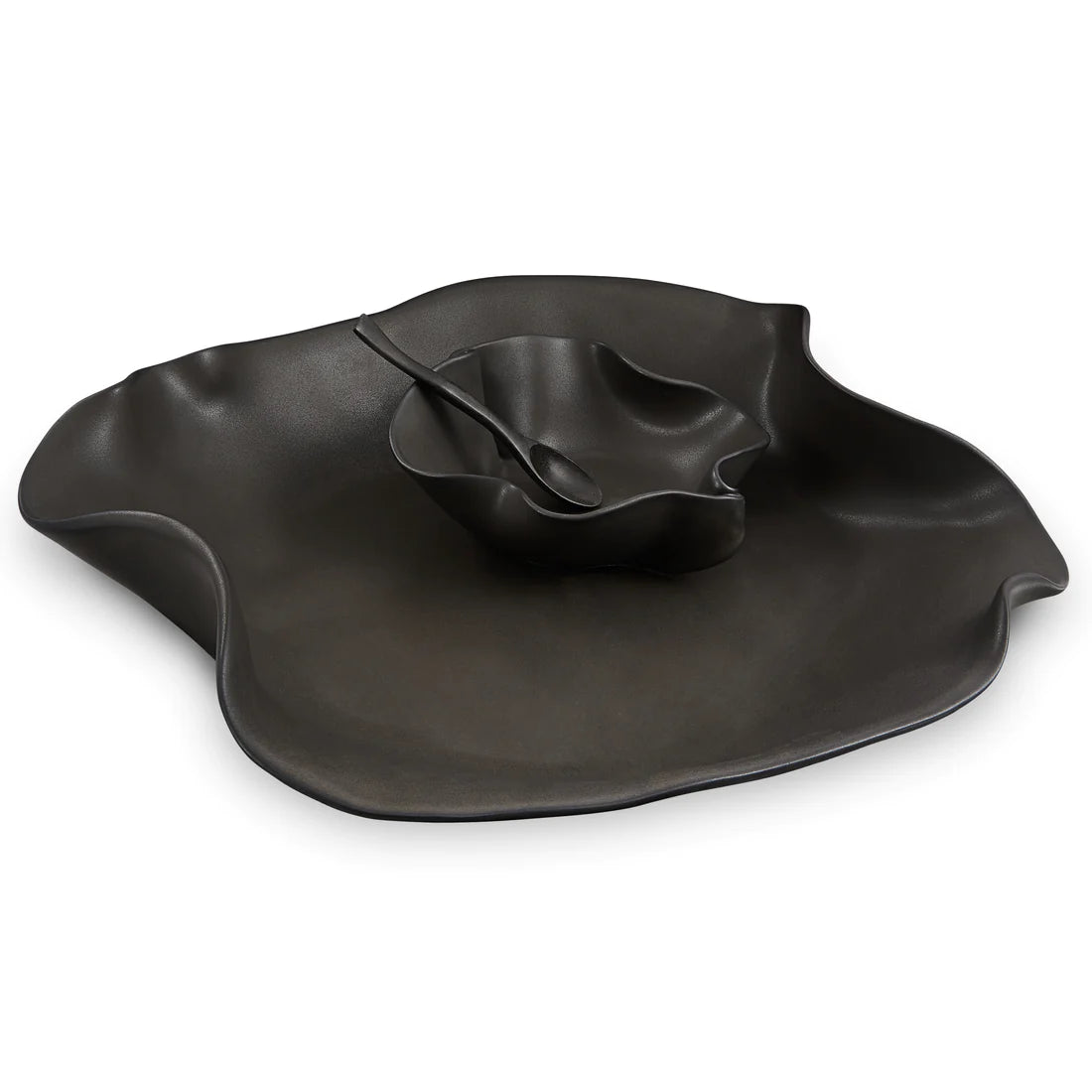 Irregular ceramic dishes attached together. the bowl has attached to the plate.