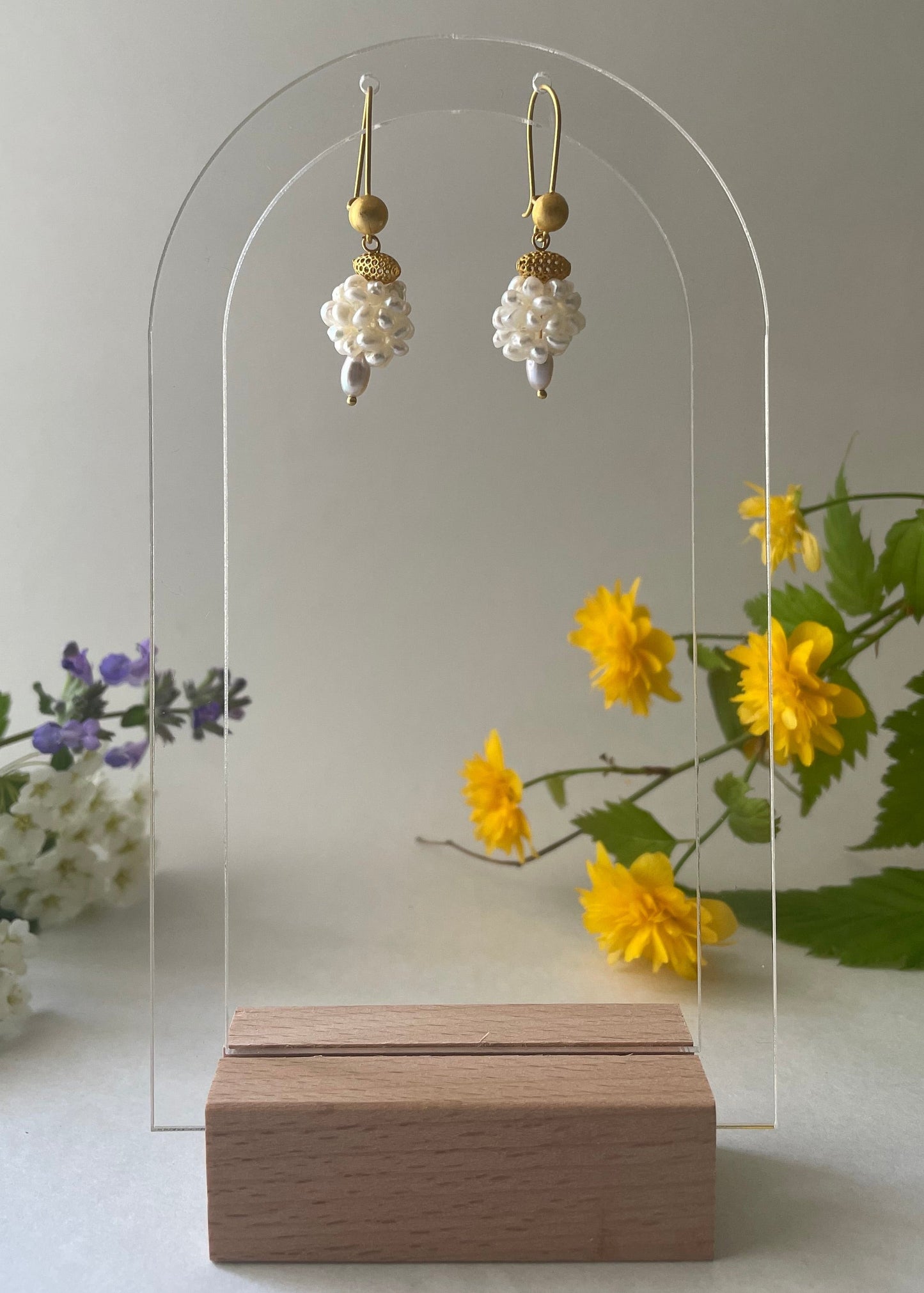 very small pearls and gold earrings.