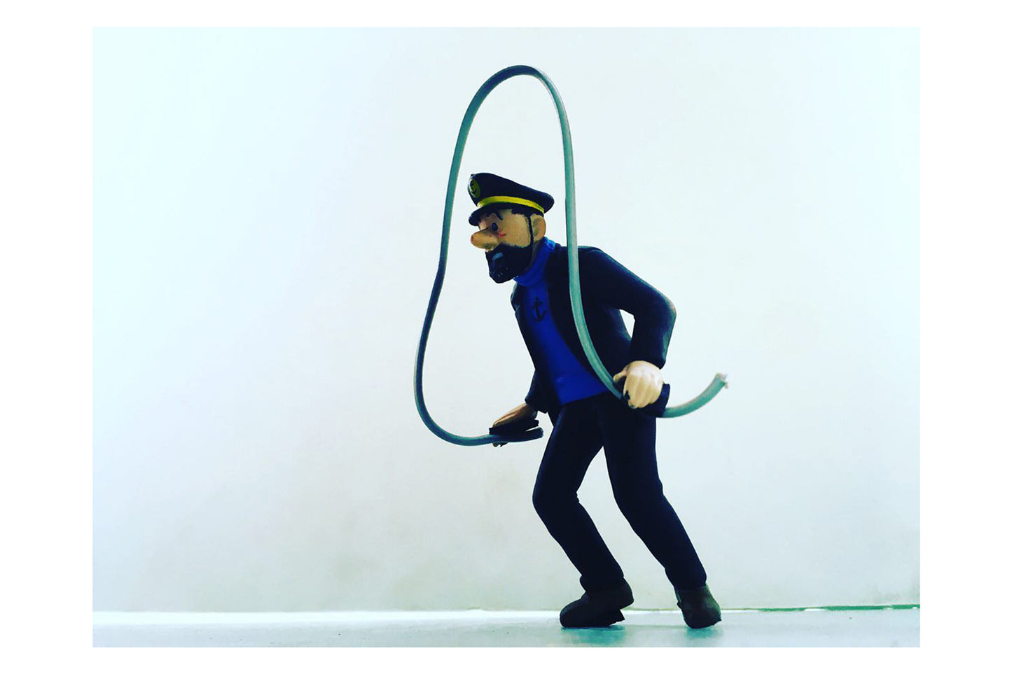 Captain Haddock has rope in his hand