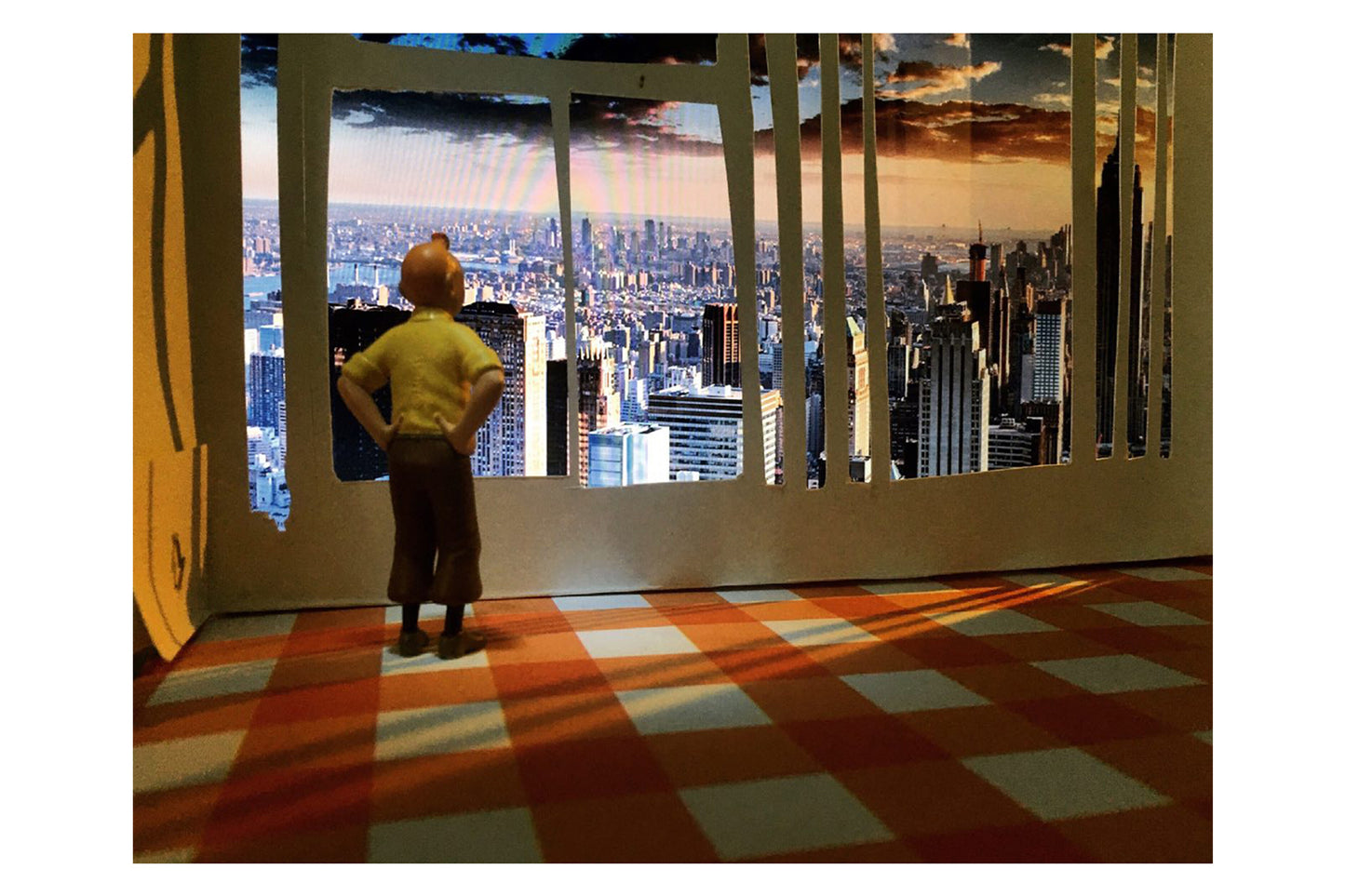 Tintin in a building looking urban view