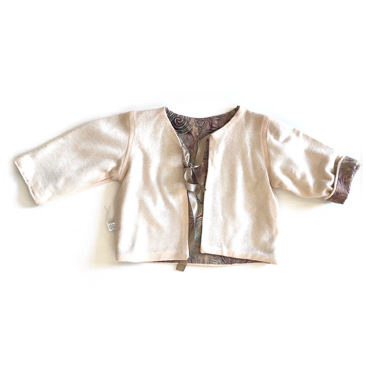 Beige jacket with colorful lining.