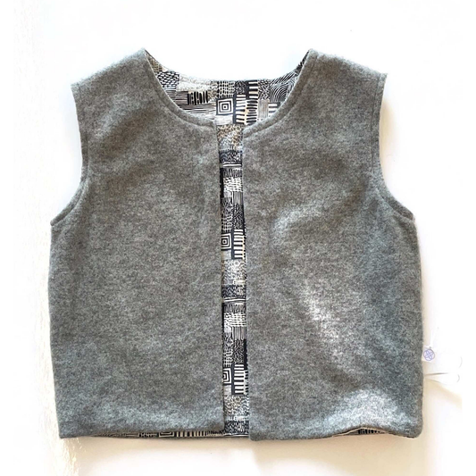 Gray vest.