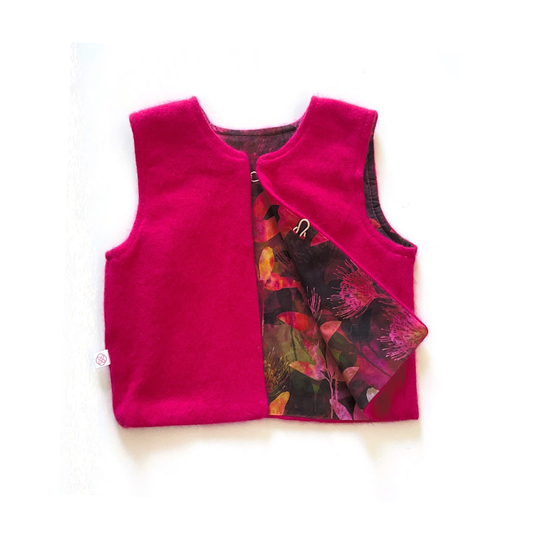 Pink wool vest with colorful lining.