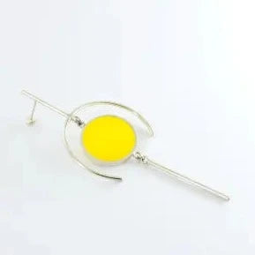 Geometric earring with circle filled with yellow epoxy resin