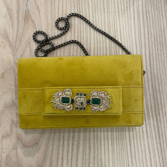Yellow clutch with embroidery and beads.