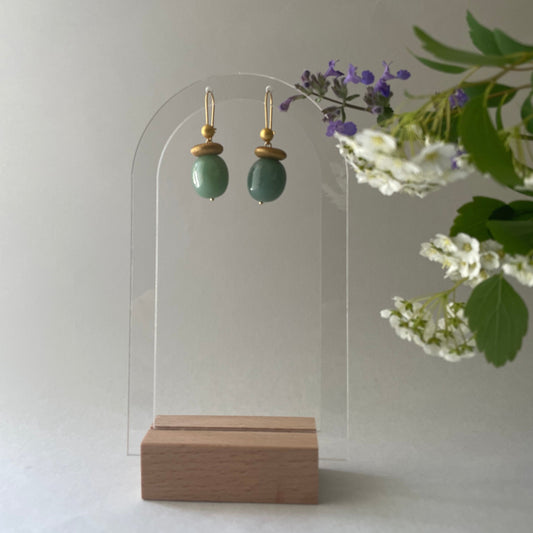 Jade stone and gold earrings.