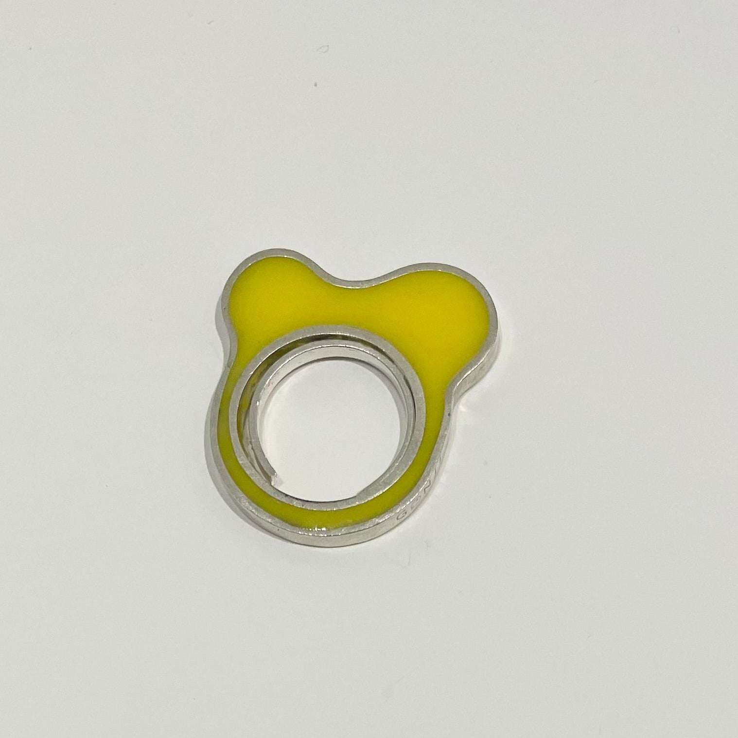 Ring made by silver and filed by yellow epoxy resin.