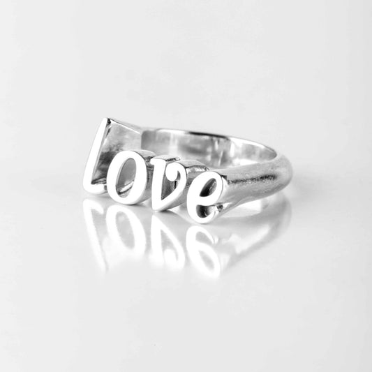 Silver Ring become in the shape of Hope inscription.