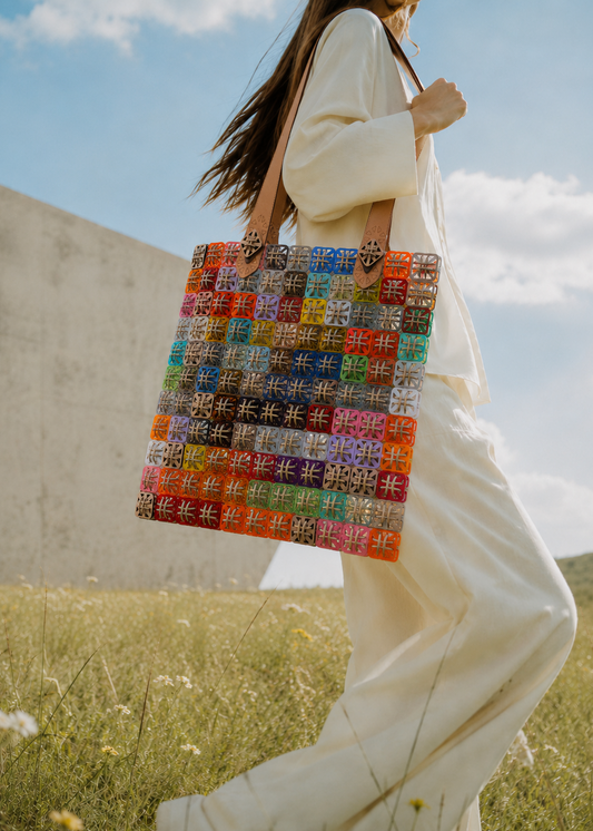 Handcrafted pixel shoulder bag in laser-cut acrylic and cord by Studio Jazbi