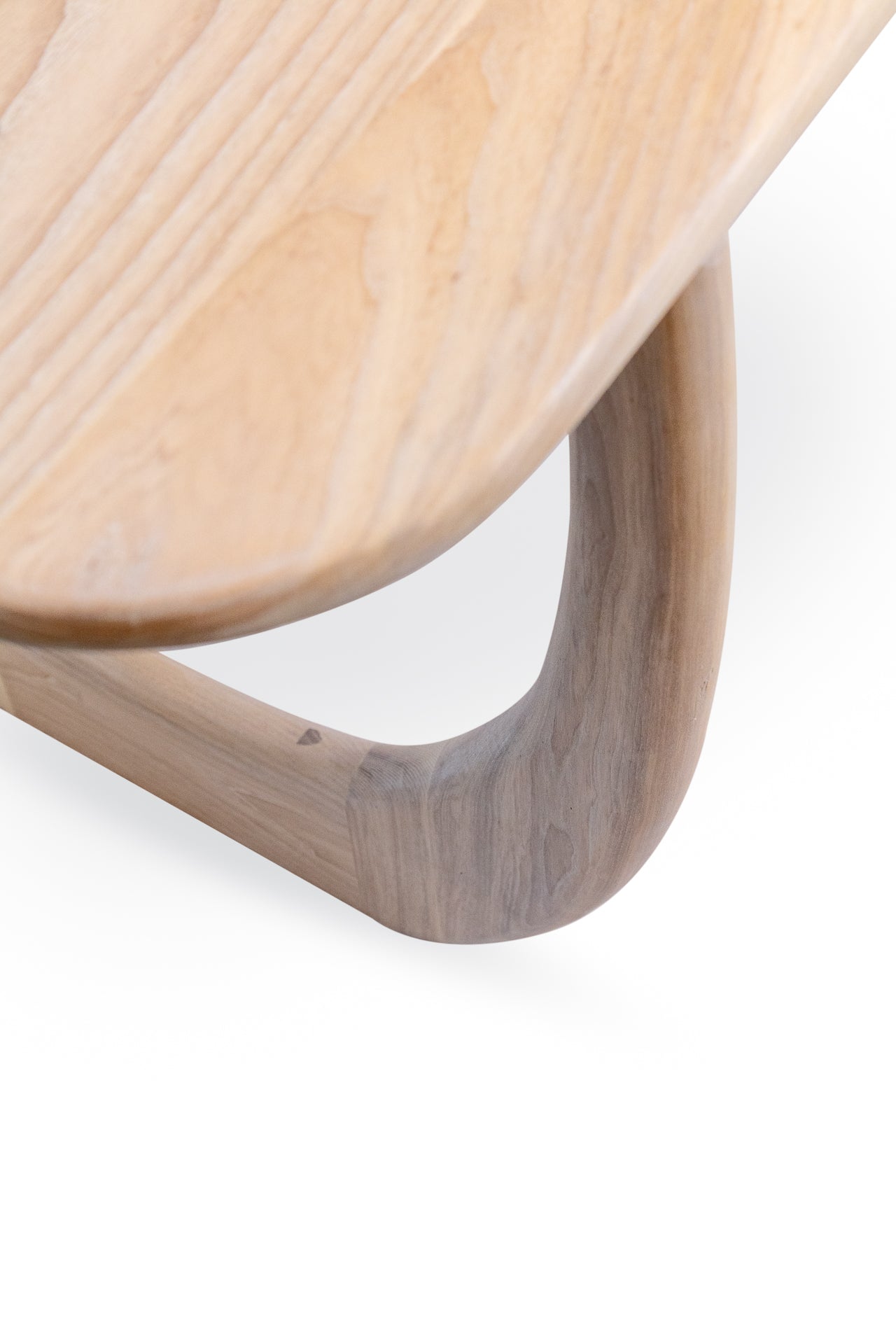 Details including wood texture and elegant curved edges