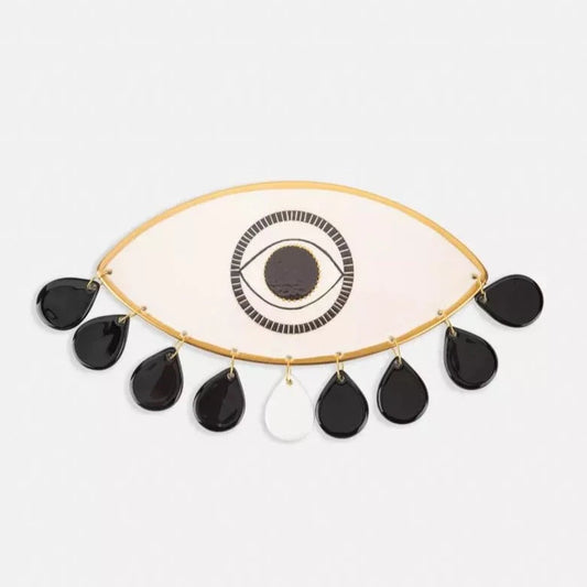 Beige ceramic eye sconce with black tears pendant