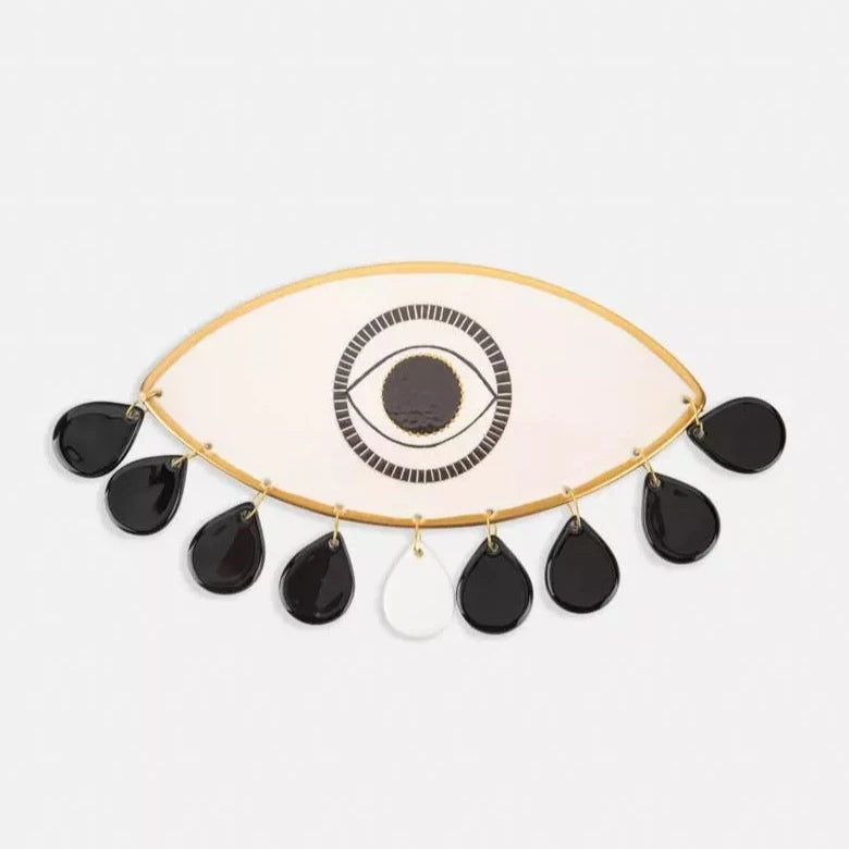 Eye sconce with tear pendant
