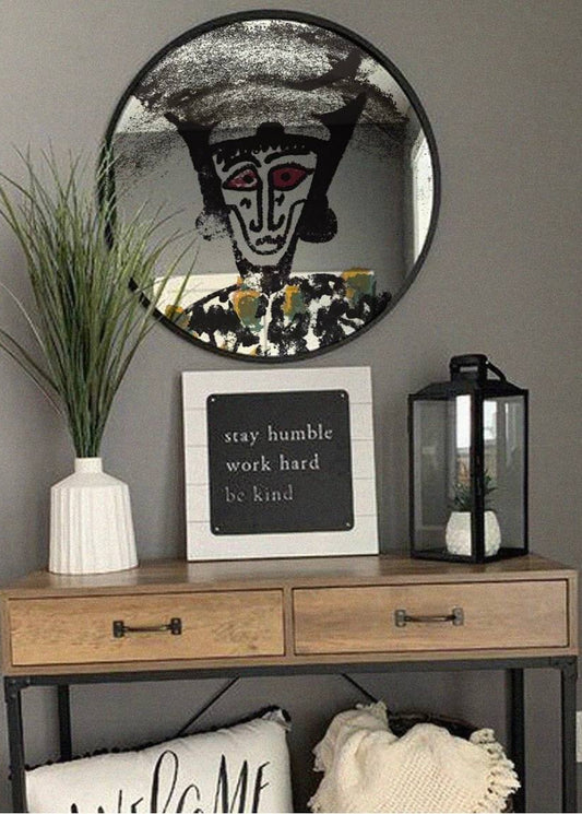 Circle mirror with metal frame and digital print.