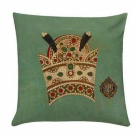green cushion with crown picture.
